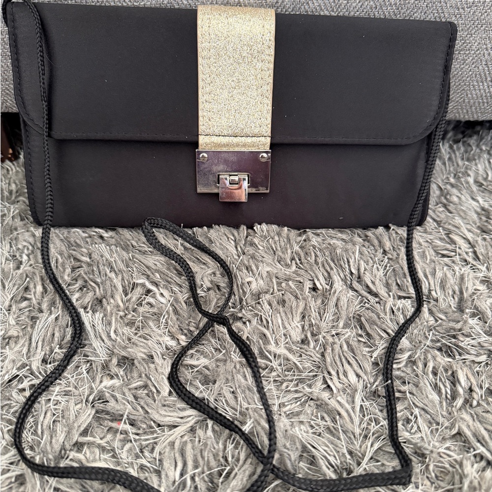 Elegant Black and Gold Clutch Bag